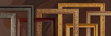 a line of picture frames of various designs